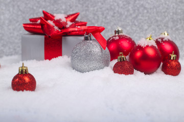 Fototapeta na wymiar Christmas balls in snow