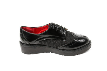 Women's platform black shoes isolated on white background