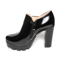 Women's platform black shoes isolated on white background colored