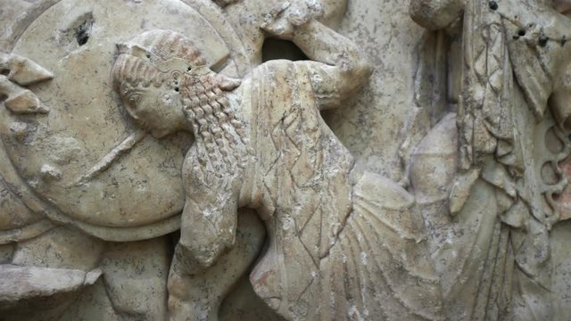 Olympic goddess of wisdom Athena in ancient greek relief representation