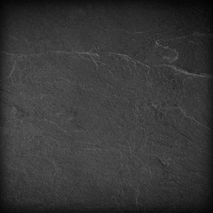 Dark grey black slate background or texture.
