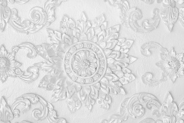 Fototapeta na wymiar White stucco floral for decoration background