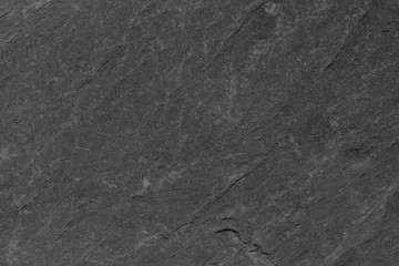 Dark grey black slate background or texture.