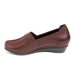 Women's leather platform shoes isolated on white background