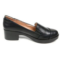 Women's leather platform shoes isolated on white background