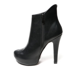 Women's leather platform shoes isolated on white background