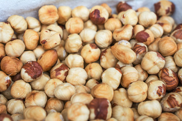 Heap of peeled hazelnuts.Close up shoot and with shallow depth of field