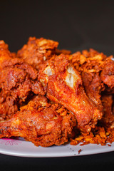 Hot and crispy fried chicken legs, thai style.