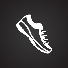 Running shoes on black background icon