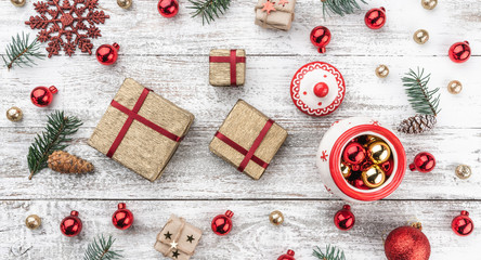 Frame on christmas background of old wood. Xmas items. Gifts for loved ones. Top view. Horizontally Xmas card.