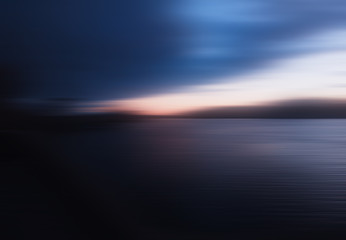 Fototapeta premium Horizontal motion blur sunset on river background