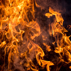 The texture of red fire on a black background