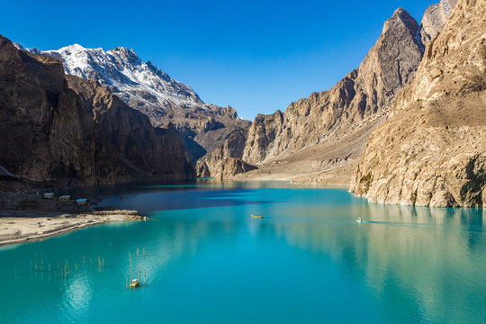 attabad lake in autumn with clear blue sky