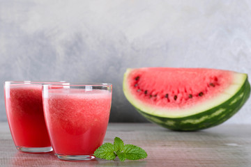 Watermelon smoothie on wood background , healthy drink. Summer. Watermelon pieces. 