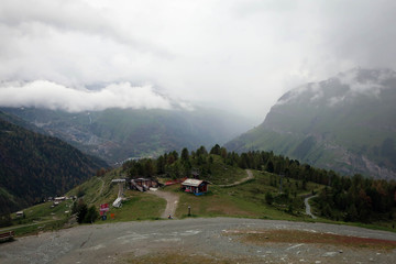 Village of Zermatt panoramic view, valleys and slopes of Swiss Alps