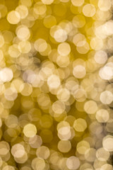 blurred background of light gold bokeh