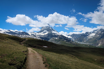 Naklejka premium Scenic bright view of Matterhorn and clouds around, Swiss Alps near Zermatt