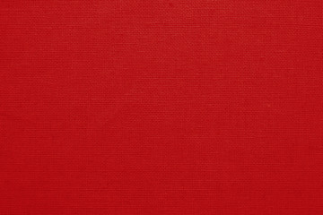 Red cotton fabric texture background, seamless pattern of natural textile.