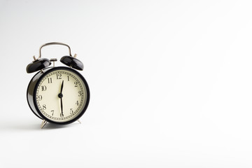 Alarm clock isolated on white background with selective focu