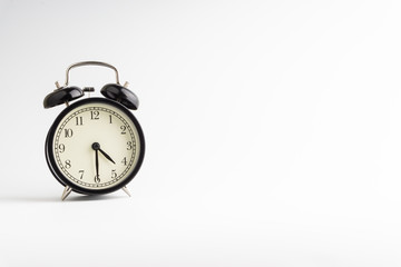 Alarm clock isolated on white background with selective focu