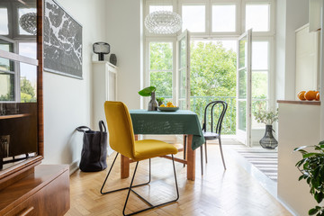 Stylish apartment decor idea, eclectic kitchen with balcony, real photo - obrazy, fototapety, plakaty