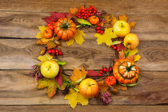Thanksgiving door wreath with apples, berries and leaves