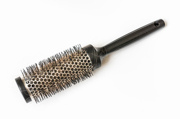 Comb brush with lost hair - baldness concept