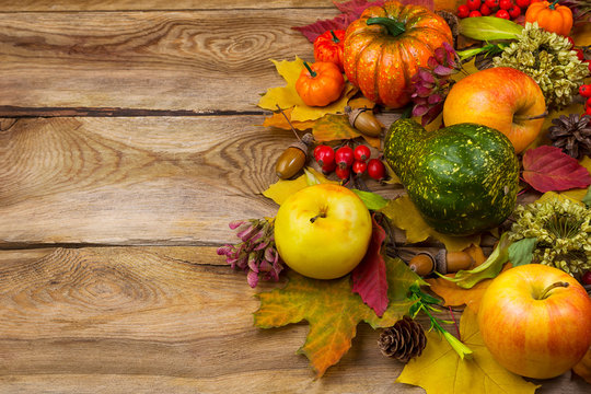 Background with fall leaves and apples, copy space