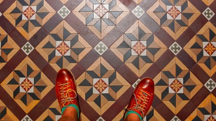 Standing on beautiful peranakan house tiles and mosaic