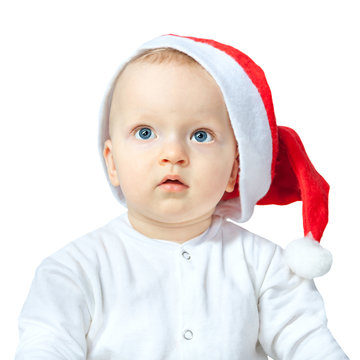 baby in Christmas hat Santa isolated on white background