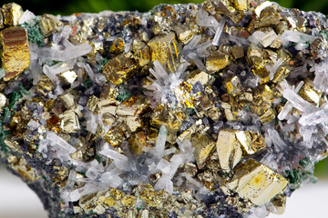 Macro shooting of natural gemstone. The raw mineral is pyrite, China. Isolated object on a white...