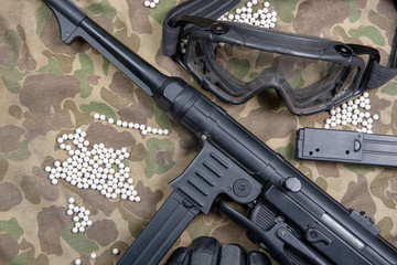 air soft gun with protective glasses and lot of bullets