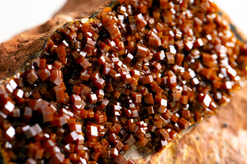Macro mineral stone Vanadinite on a white background close up