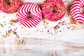 Donuts on a wooden background.