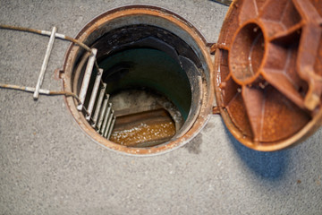 Emptying septic tank, cleaning the sewers. Septic cleaning and sewage removal. Emptying household septic tank. Cleaning sludge from septic system.