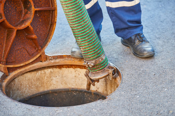 Emptying septic tank, cleaning the sewers. Septic cleaning and sewage removal. Emptying household...