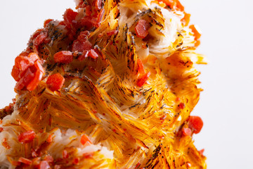 Macro mineral stone Vanadinite on a white background close up
