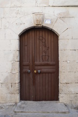 old brown  wooden door in wall