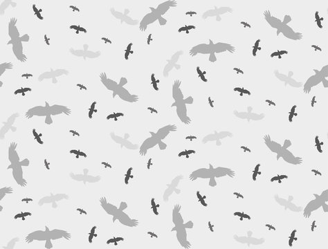 seamless background with a silhouette of flying birds gray