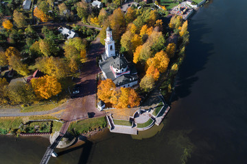 Aerial view of the Church of the Holy Prince Alexander Nevsky in golden autumn. Ust-Izhora, a...