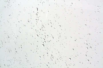 Blured water drops on window.