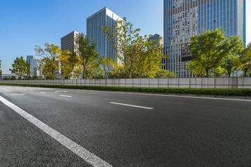 cityscape and skyline from empty asphalt road