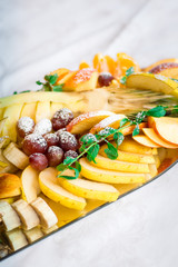 Platter of a assorted fresh fruit cut professionally