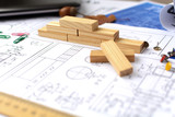 The architect's hands on the drawings are developing a construction plan. Business and Construction