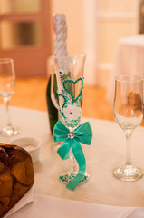 Wineglass and bottle of champagne