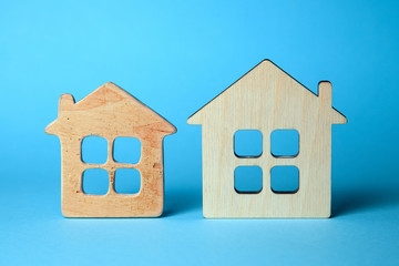 Old and new home. The concept of buying a home, the choice of an old house for repair or a new house. How to choose a construction company