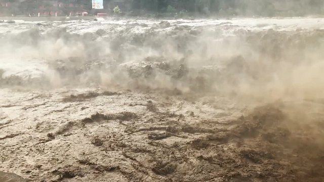Slow motion and closeup of Hukou waterfall and Yellow River, Shanxi province, China