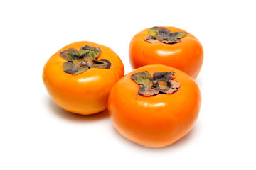 Group of Fresh Persimmon on iSolated White Background. Healthy Fruit