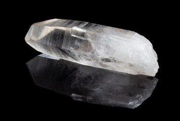 Natural quartz crystal rhinestone on a black background