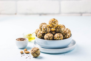 Apricot almond cashew energy balls. Selective focus, space for text.